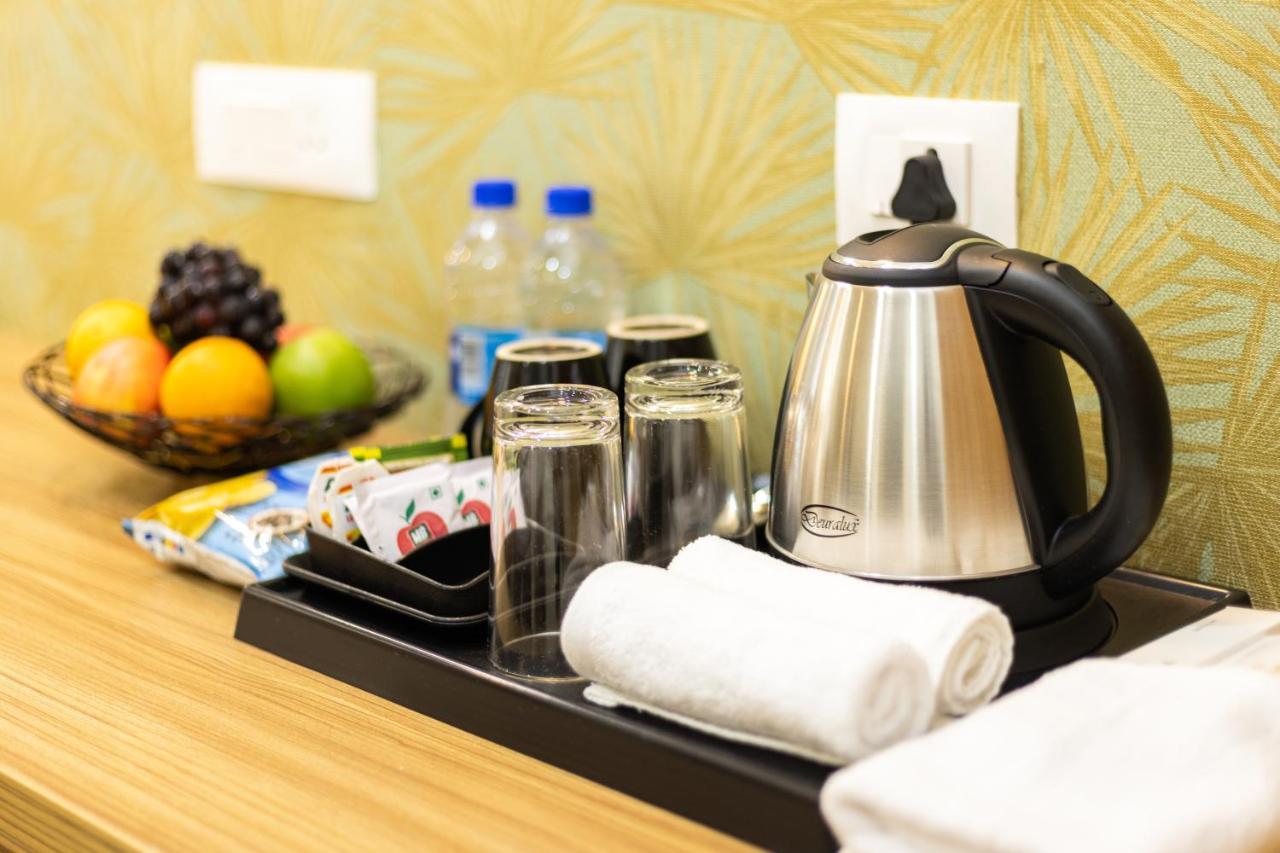 Esaa Airport Hotel Kochi Kültér fotó