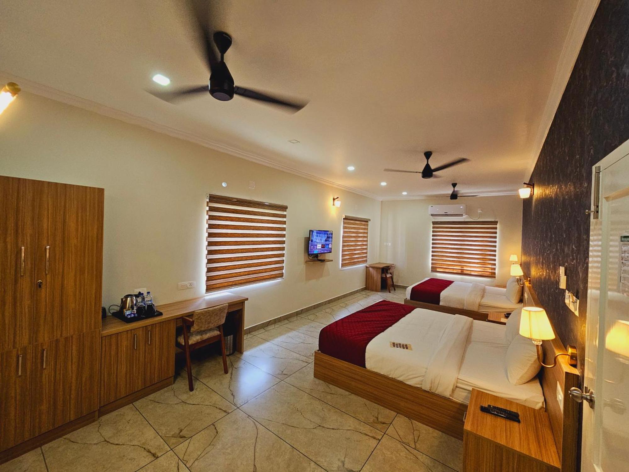Esaa Airport Hotel Kochi Kültér fotó