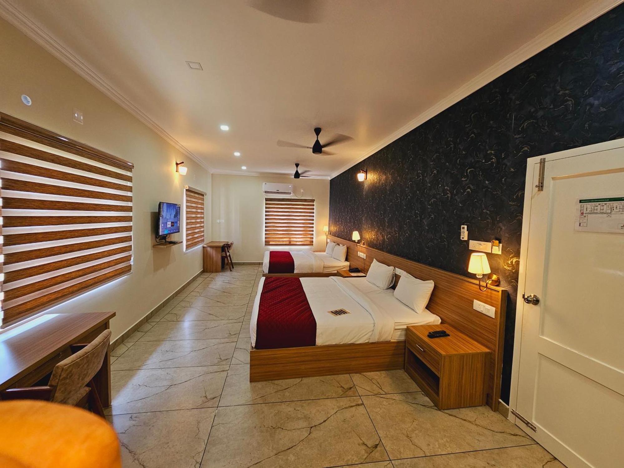 Esaa Airport Hotel Kochi Kültér fotó